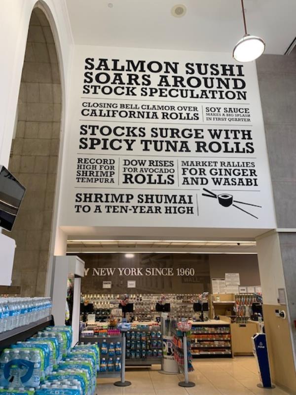 A fresh sushi sign inside the store.
