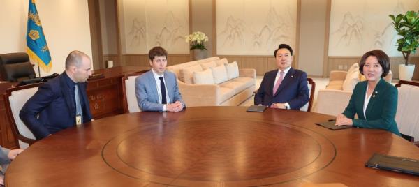 Sam Altman at a table in South Korea with its president Yoon Suk